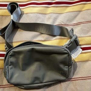 Lululemon 1L belt bag, light gray with white. New with tags